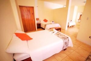 tours a galápagos hotel albatros habitación cuádruple